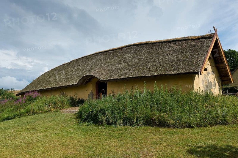 Longhouse, reconstructed courtyard with nine houses built by a large farmer from the Viking Age, Fyrkat Viking Farm, Hobro, Denmark