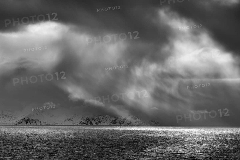 Dramatic lighting over the Norwegian European Sea, Söröya, Finnmark, Norway, March 2019
