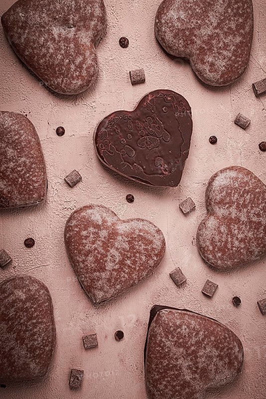 Food wallpaper, chocolate glazed gingerbread, heart-shaped, top view, no people