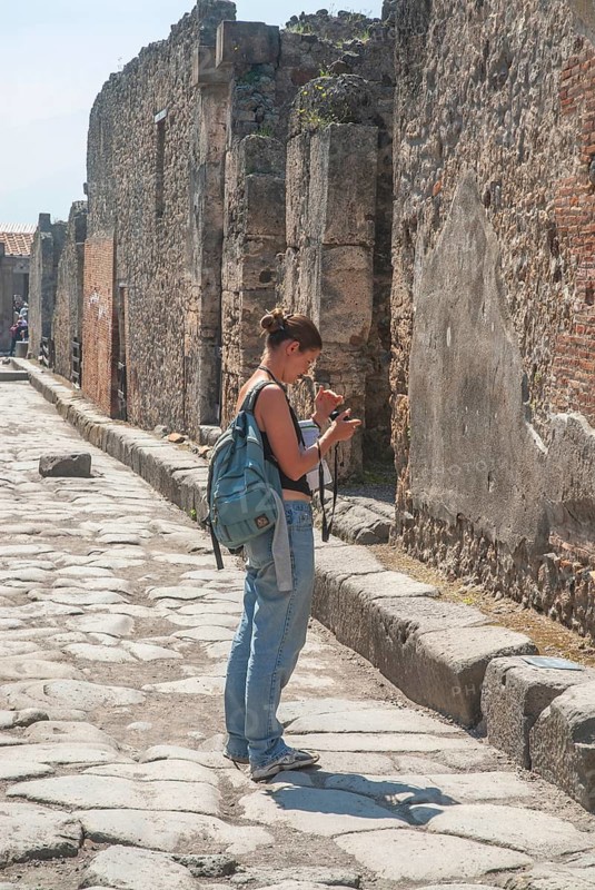 Tourist at the ruins in the archaeologic site of Pompei, UNESCO World Heritage Site, province of Naples Campania, Italy, Southern Europe