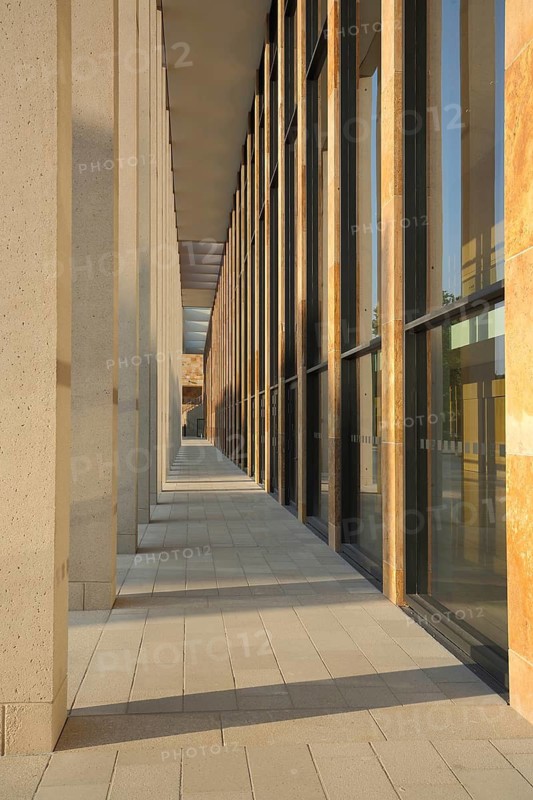 RheinMain CongressCenter portico built in 2018 with flags, modern building, former Rhine-Main Hall, exhibition hall, convention center, colonnade, vanishing point, Wiesbaden, Taunus, Hesse, Germany