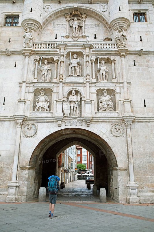 Pilgrims at the medieval city gate Arco de Santa Maria in Burgos, province of Burgos, Castile and Leon, Spain