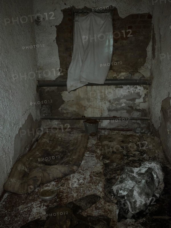Cell in the basement of the police station. After the occupation of the city by the Russian army, over 200 people were imprisoned, interrogated and tortured here in freezing temperatures, Isjum, Kharkiv, Ukraine