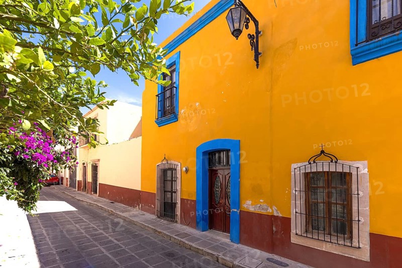 Colorful old city streets in historic city center of Zacatecas near central cathedral. It is a popular mexican tourism destination