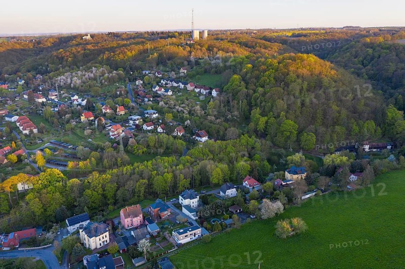 View of Niederwartha, on the hill the upper towers of the former pumped storage plant, Dresden, Saxony, Germany