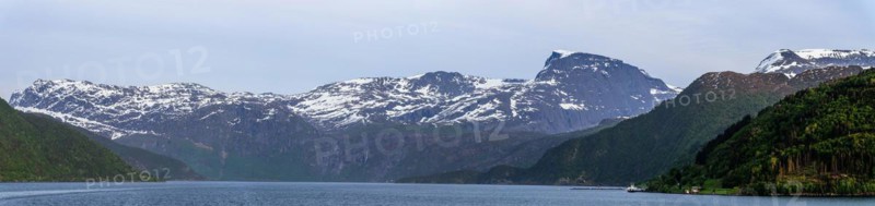 Panorama of Mountains and Fiord over Norwegian Village, Olden, Innvikfjorden, Norway