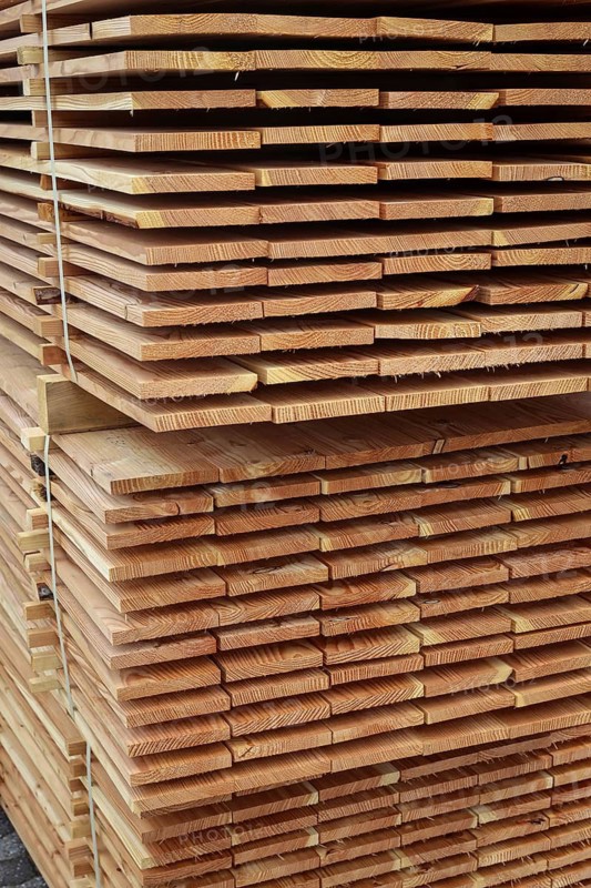 Solingen, North Rhine-Westphalia, Germany - Larch logs are processed into construction timber, construction timber is scarce and expensive, carpentry and joinery companies are struggling with rapidly rising raw timber prices in times of the corona crisis, and large quantities of logs are exported to China and the USA