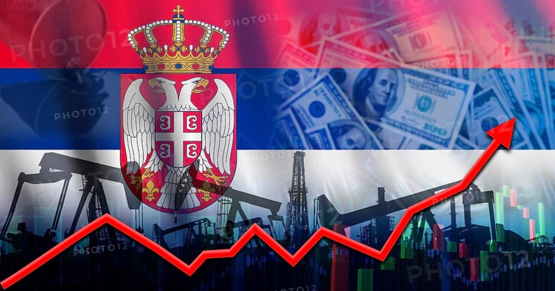 Oil production with Serbia flag. Oil pumps with Serbian flag