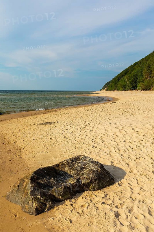 Beach at sunset, close to Miedzyzdroje (Misdroy), a village in Kamien Pomorski County, West Pomeranian Voivodeship, in northern Poland and the Wolin National Park