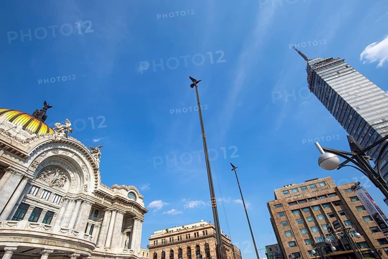 Mexico, Mexico City, 20 December, 2019: Landmark tower Torre Latinoamericana and Palace of Fine Arts (Palacio de Bellas Artes) near the Alameda Central Park and Zocalo Historic Center