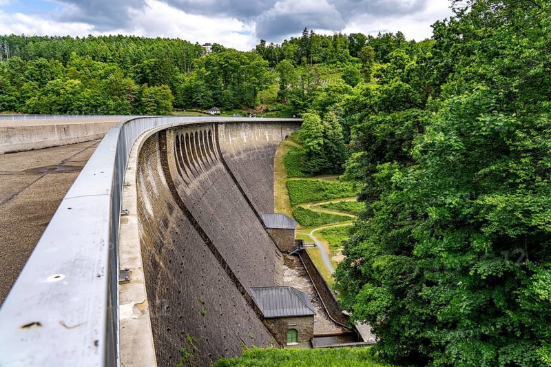 The Aggertalsperre dam in Oberbergisches Land, near Bergneustadt, operated by the Aggerverband, 45 metre high dam wall, the reservoir is used for water supply and electricity production, North Rhine-Westphalia, Germany