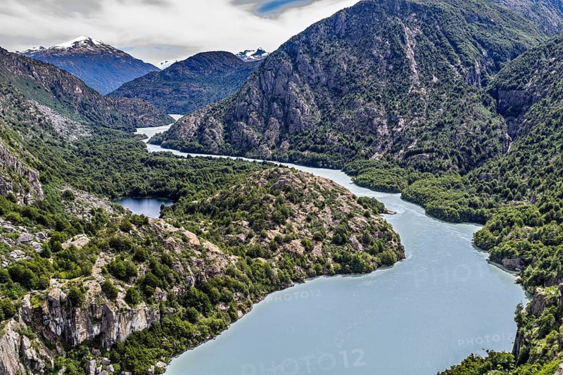 River Rio Baker River, rapids in the river, just north of the Corte San Carlos historical pioneer trekking route carved into the cliff, aerial view, Patagonia, Chile