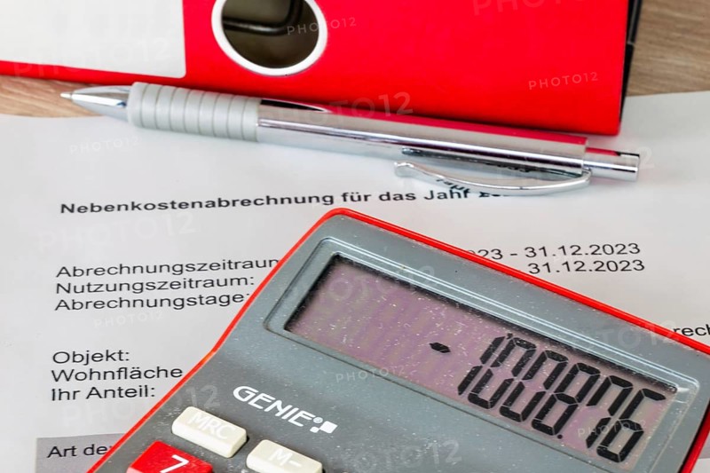 Symbolic image of service charges: Close-up of a symbolic service charge statement