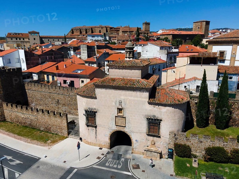 Historic city with a fortified entrance gate and a well-preserved city wall, surrounded by old buildings with red roofs, aerial view, Puerta de Trujillo, city gate, Plasencia, Cáceres, Caceres, Extremadura, Spain