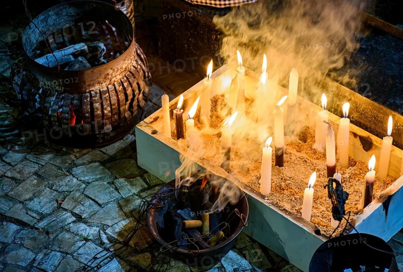 Smokers and candles as an offering to Umbanda entities in Brazil