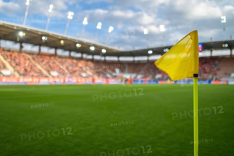 Flag in the corner of football pitch at the stadium during match in Lubin, Poland