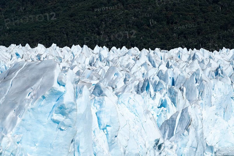 Perito Moreno Glacier ice front with blue ice crevices, Los Glaciares National Park, Santa Cruz Province, Patagonia, Argentina