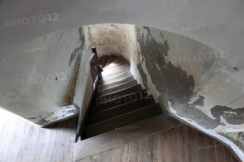The picture shows the interior of the Chindia Tower, the staircase shown leads through the historic masonry of the tower, Turnul Chindiei, in Targoviste, Romania