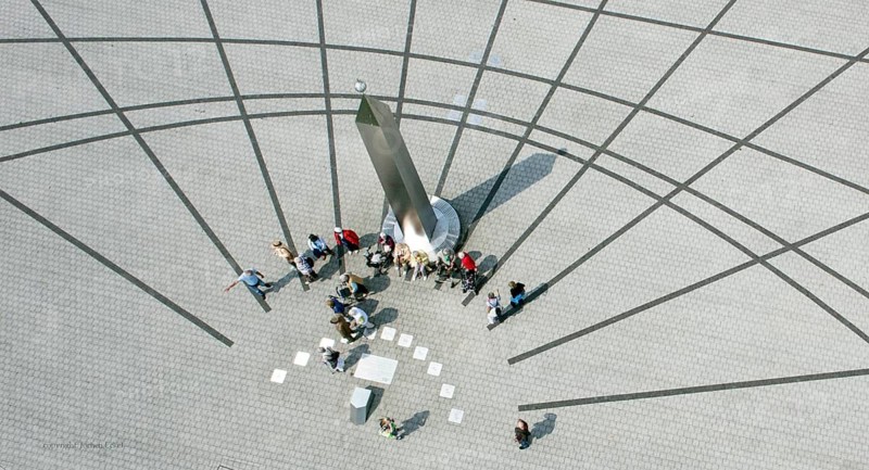 Herten, DEU, 05.06.13 JE - Visitors look at an obelisk on a large sundial in the Hoheward Landscape Park, created on a former heap of the Ewald mine in Herten. The approximately 3, 000 m² horizontal sundial is located on the southern plateau at an altitude of around 140 meters. Since the beginning of 2011, the landscape park has been part of the Route of Industrial Heritage