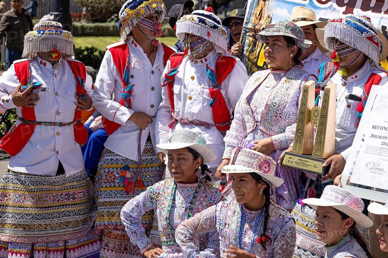 Arequipa, Peru, 2 February, 2026: Native indigenous people of Peru in National costumes perform dances and take images with people in Plaza de Armas in Arequipa, Peru