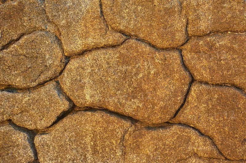 Stone with cracks, weathered rock by the sea, Quiberon, Brittany