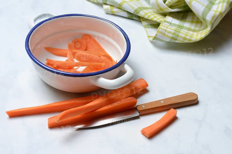 Carrot, carrot sticks with knife