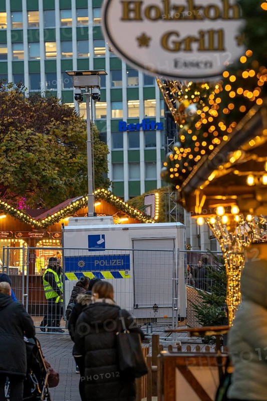 Video surveillance by the police at the Porschekanzel, in front of the Marktkirche in the city centre of Essen, during the Christmas market, mobile surveillance system, crime focus, drug scene, street crime, the images are transmitted in real time to the police control centre, temporary attempt to make the city safer and deter criminals, North Rhine-Westphalia, Germany