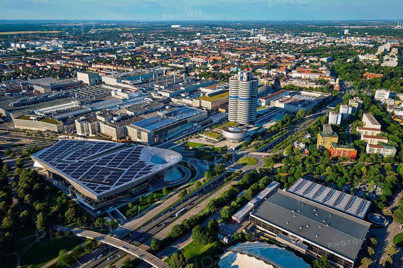 MUNICH, GERMANY, JULY 08, 2018: Aerial view of BMW Museum and BWM Welt and factory and Munich from Olympic Tower. BMW is a famous German luxury car automaker