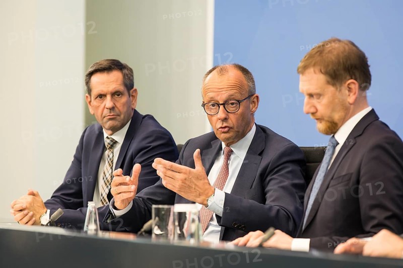 Olaf Lies (SPD, Minister President of Lower Saxony), Federal Chancellor Merz (CDU, Federal Chancellor) and Michael Kretschmer (CDU, Minister President of the Free State of Saxony) during a press conference after the consultation between Federal Chancellor Friedrich Merz and the heads of government of the federal states in the Federal Chancellery, Berlin, 18 June 2025