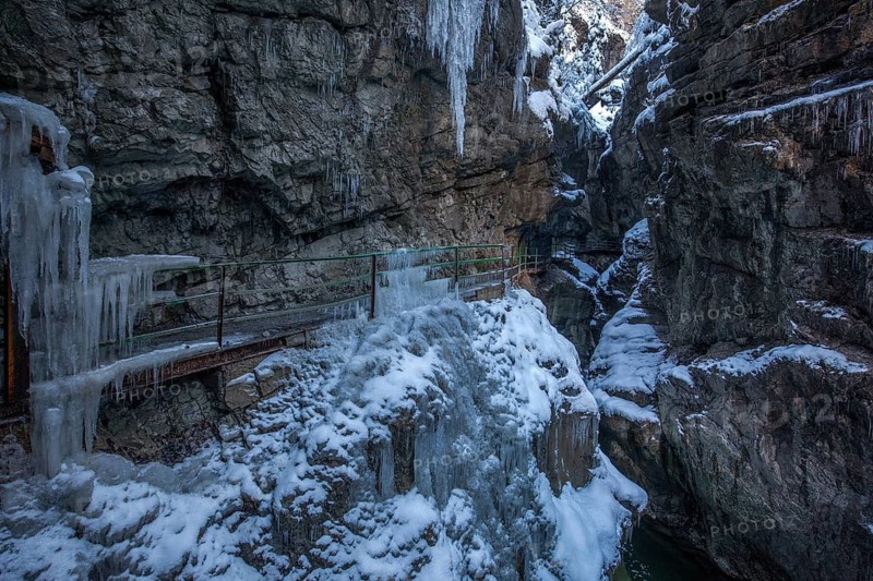 Winter, snowy landscape, icicles, river Breitach and hiking trail through the Breitachklamm gorge near Oberstdorf, Oberallgäu, Allgäu, Bavaria, Germany