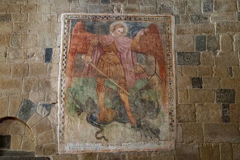 Fresco in the interior of the Romanesque church Église de la Sainte-Trinité et de Saint Jean-Baptiste with the Archangel Michael in Aregno, Balagne, Corsica, France