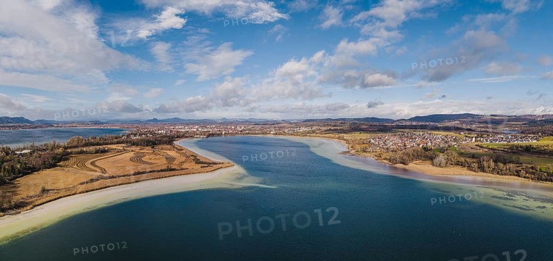 Aerial view, panorama of the Mettnau peninsula near Radolfzell am Lake Constance at low tide, the Hegauberge mountains on the horizon, district of Konstanz, Baden-Württemberg, Germany