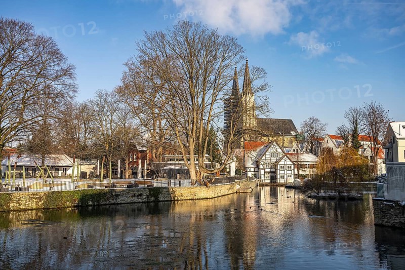 Large pond, meadow church and pond mill in Soest, North Rhine-Westphalia, Germany