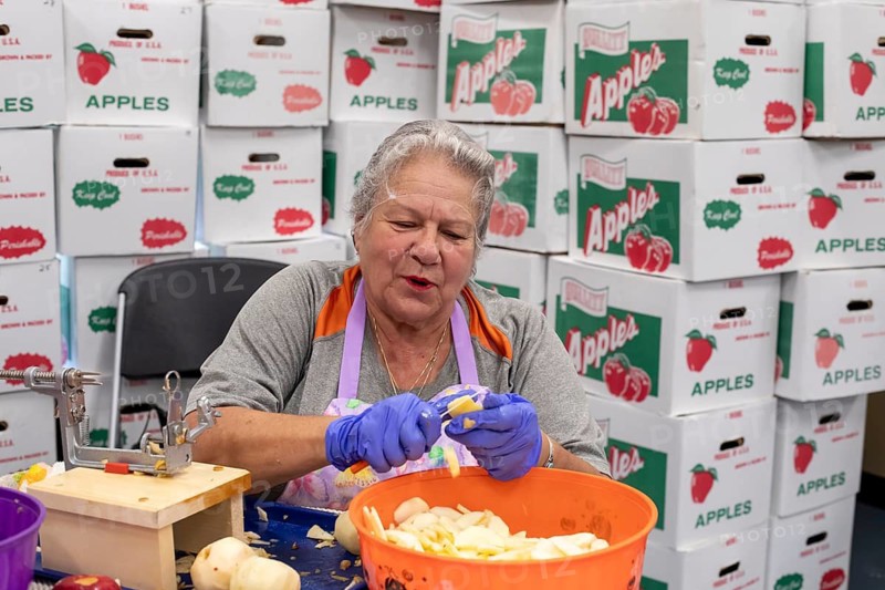 St. Clair Shores, Michigan, Volunteers at the St. Clair Shores Senior Center make apple pies during their annual Apple Pie Week. They make about 900 pies, which are sold to raise funds for the Center's meal program