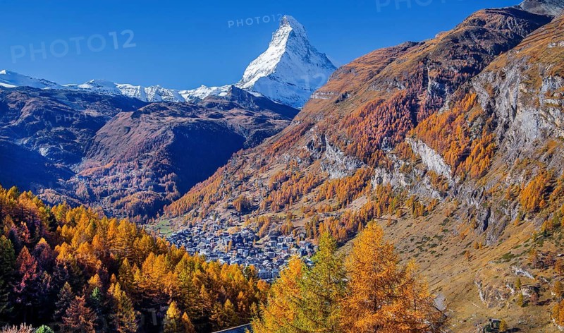 View from the hamlet of Ried down into the valley to the village and the Matterhorn 4478m in autumn, Zermatt, Mattertal, Valais, Switzerland