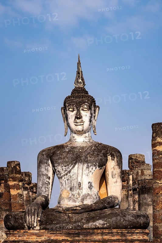Buddha statue in the central Buddhist temple Wat Mahathat, UNESCO World Heritage Sukhothai Historical Park, Thailand
