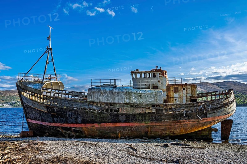Corpach Wreck or Old Boat of Caol and Nevis Range Mountains, Caol Beach, Corpach, Fort William, Highland, Scotland, UK
