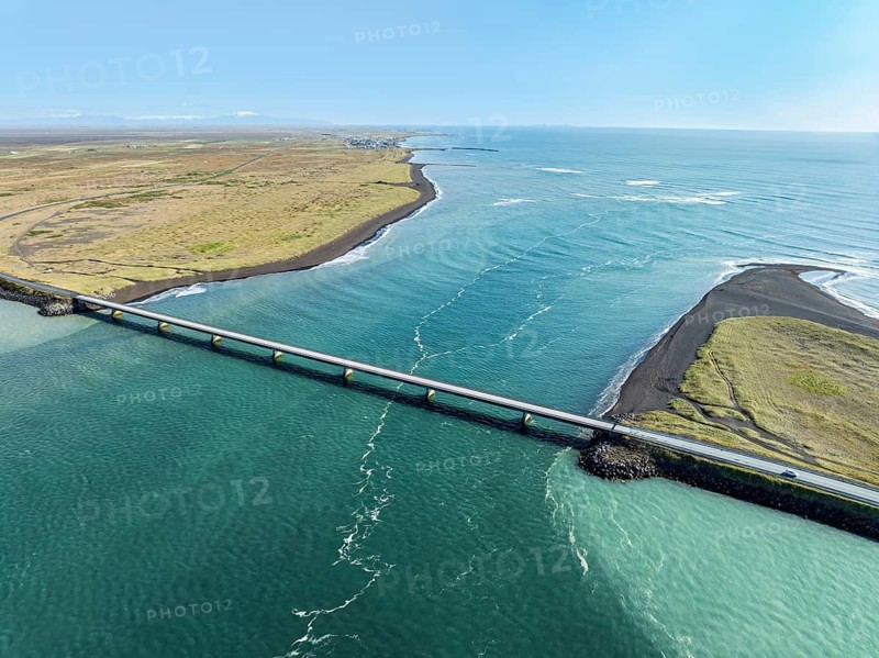 Bridge over Ölfusa river, open sea, near Eyrarbakki, aerial view, southern coast, Iceland