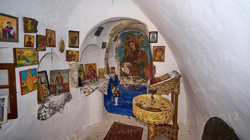 Small chapel full of religious icons and murals in an intimate atmosphere, Panagia Thermiani Chapel, Pali village, Pali, Volcanic Island, Nisyros, Dodecanese, Greek Islands, Greece
