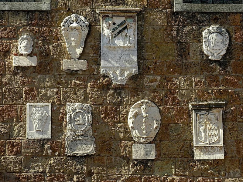 Coat of arms, official coat of arms, reliefs in marble stone, Palazzo Pretorio, Palazzo Pretorio, Archaeological Museum, Old Town, Sovana, Sorano, Province of Grosseto, Tuscany, Italy