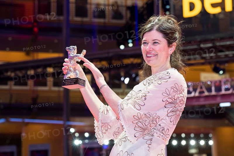 Anna Fitch (US director) poses with the Silver Bear for Outstanding Artistic Achievement for the film Yo (Love is a Rebellious Bird) after the award ceremony at the closing gala of the Berlinale at the Theater am Potsdamer Platz in Berlin on 21.02.2026. The 76th Berlin International Film Festival will take place from 12 to 22 February 2026