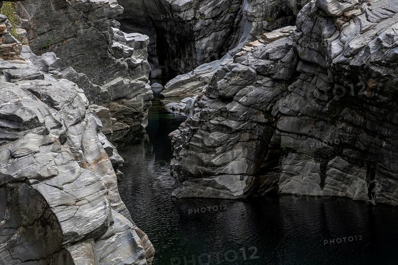 Rocks, granite rock formations in the Maggia River near Ponte Brolla, in the Maggia Valley, Valle Maggia, Canton Ticino, Switzerland