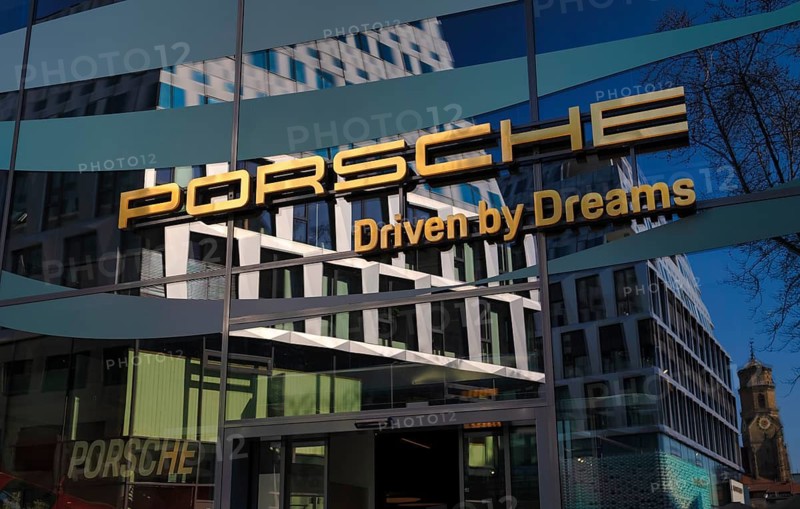 Porsche Brandstore DRIVEN BY DREAMS, shop, logo, lettering, reflection, Dorotheen Quartier, DOQU, collegiate church, Stuttgart, Baden-Württemberg, Germany