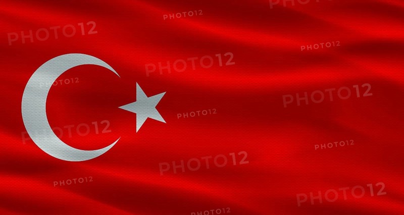 Turkish flag with a fabric texture waving. Close up of flag of Turkey with cloth texture