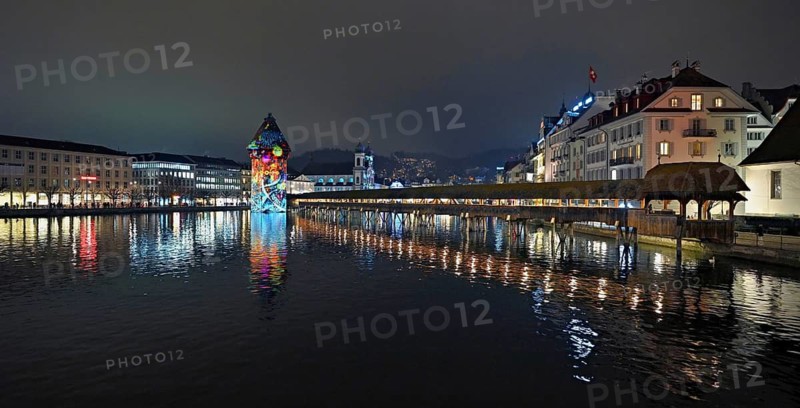 Wassertum with light installation, Chapel Bridge on the right, Jesuit Church on the Reuss at dusk behind, Old Town, Lilu, Light Festival 2025, Lucerne, Canton of Lucerne, Switzerland