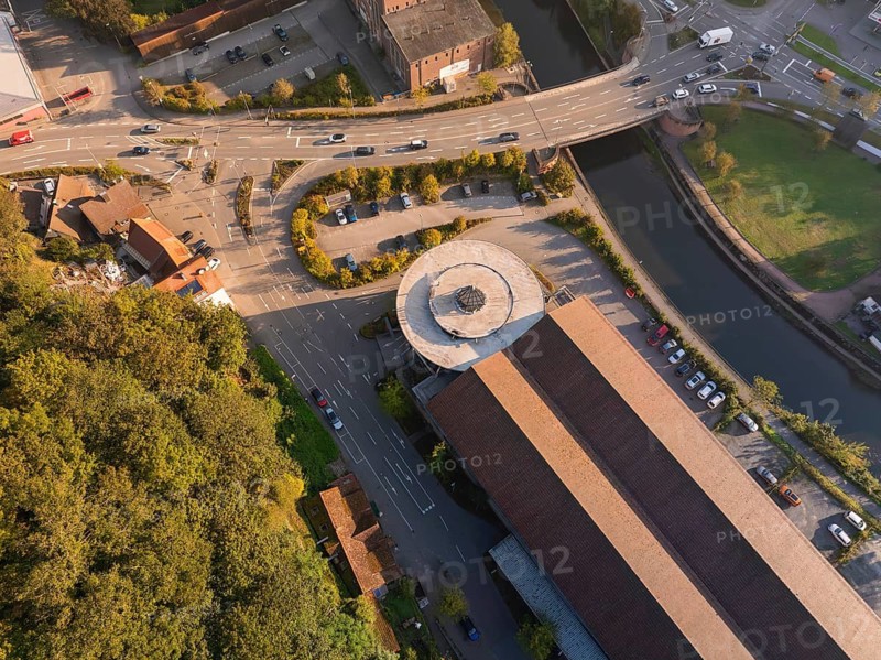 Aerial view of streets and buildings with a river and a roundabout, Calw, Black Forest, Germany