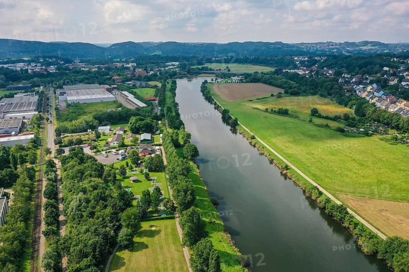 Hattingen, North Rhine-Westphalia, Germany - Landscape on the Ruhr, Ruhr promenade with Ruhr Valley cycle path, left of the Henrichshütte industrial estate in Hattingen