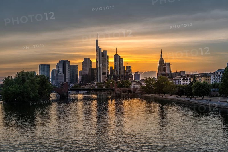View of the Frankfurt skyline at sunset from the Old Bridge, Frankfurt am Main, Hesse, Germany