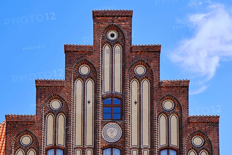 Stepped gable on the Old Customs House from 1868, heritage-protected neo-Gothic building at the Old Harbour, Old Town Hanseatic City of Wismar, Mecklenburg-Western Pomerania, Germany