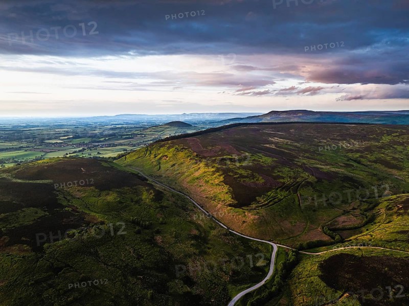 Sunset over Cod Beck Reservoir from a drone, North York Moors National Park, North Yorkshire, England, United Kingdom